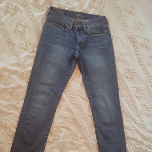 Medium Wash Skinny Jeans with Faded Look and Zipper Fly